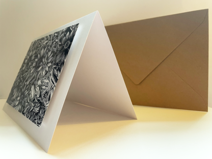 Example of a standing folding card and envelope.